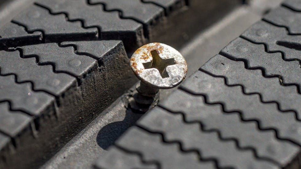 Pneu perce par une vis