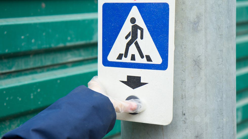 Bouton de passage pietonsur un feu de signalisation