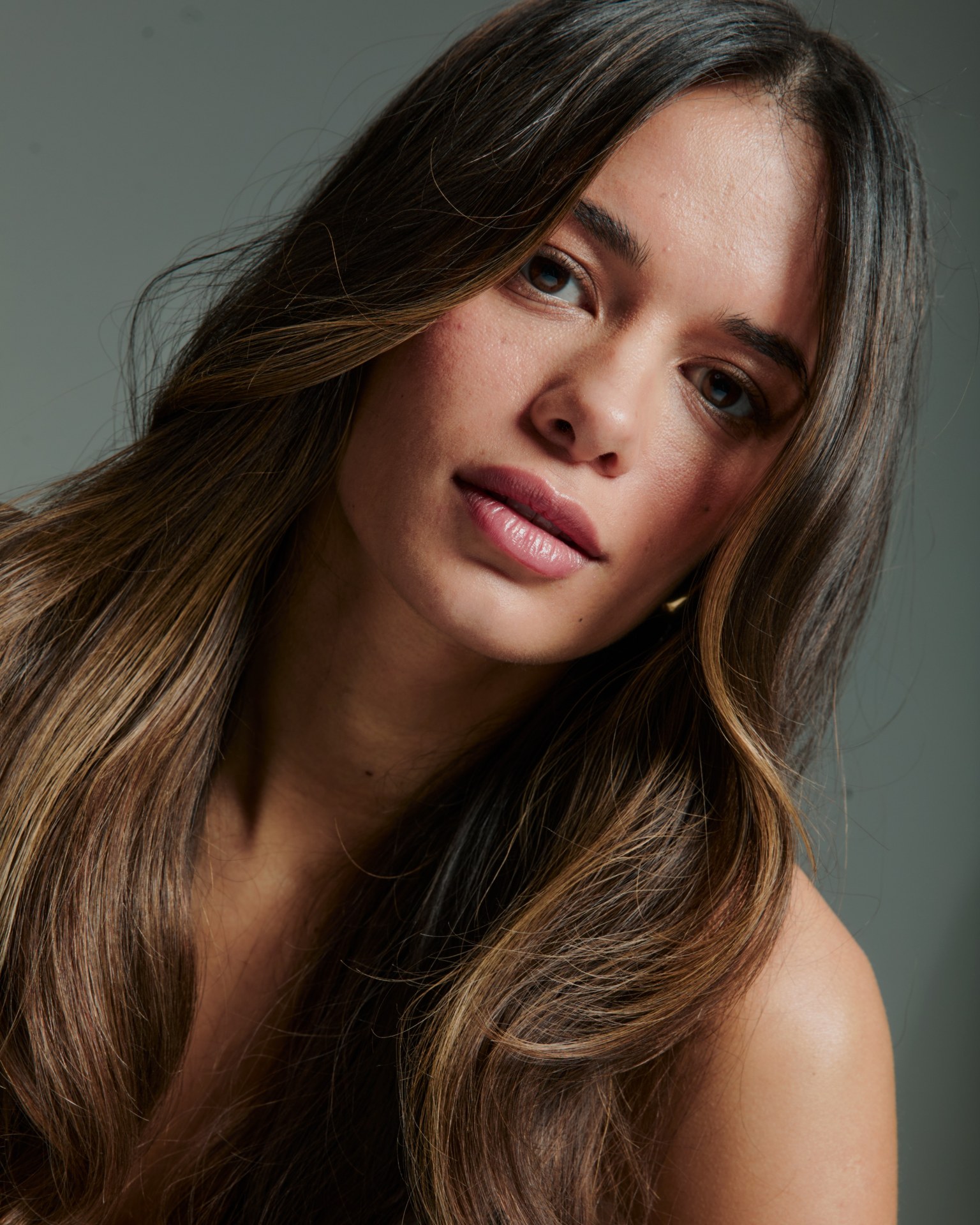 The beauty portrait before any retouching, with freckles, small blemishes and uneven patches on the skin