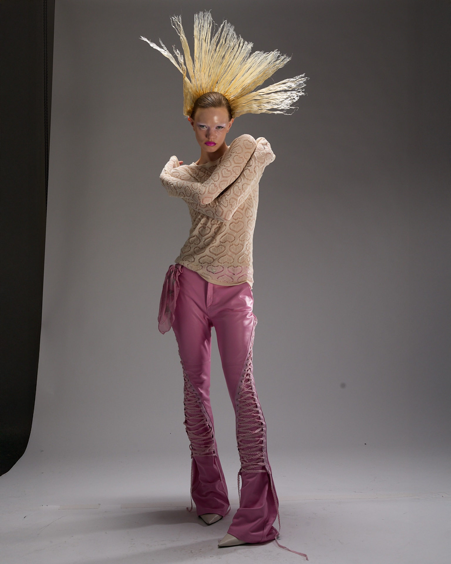 The same full-length portrait straight from the camera, grey backdrop and neutral colour