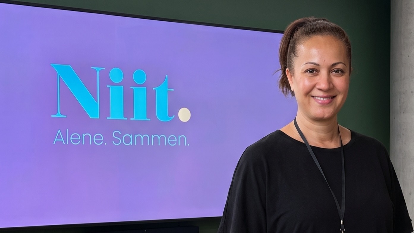 Maria Lima foran logoen til Niit. Marketing