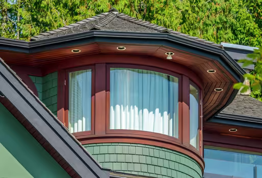 Elegant bay and bow windows showcasing double glazed window installation for enhanced energy efficiency and style.