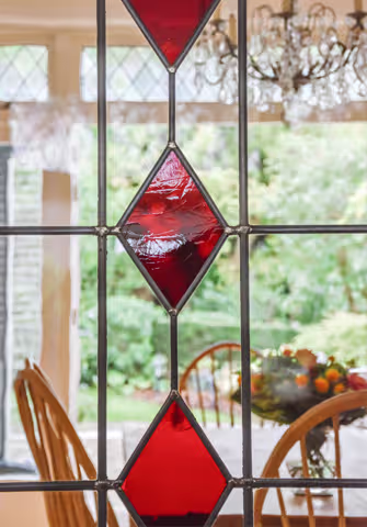 Sliding glass doors featuring Pilkington glass, enhancing privacy and energy efficiency with stylish design options.