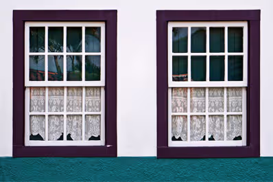White box sash window with a sleek white frame and clear glass, enhancing the elegance of any interior space.
