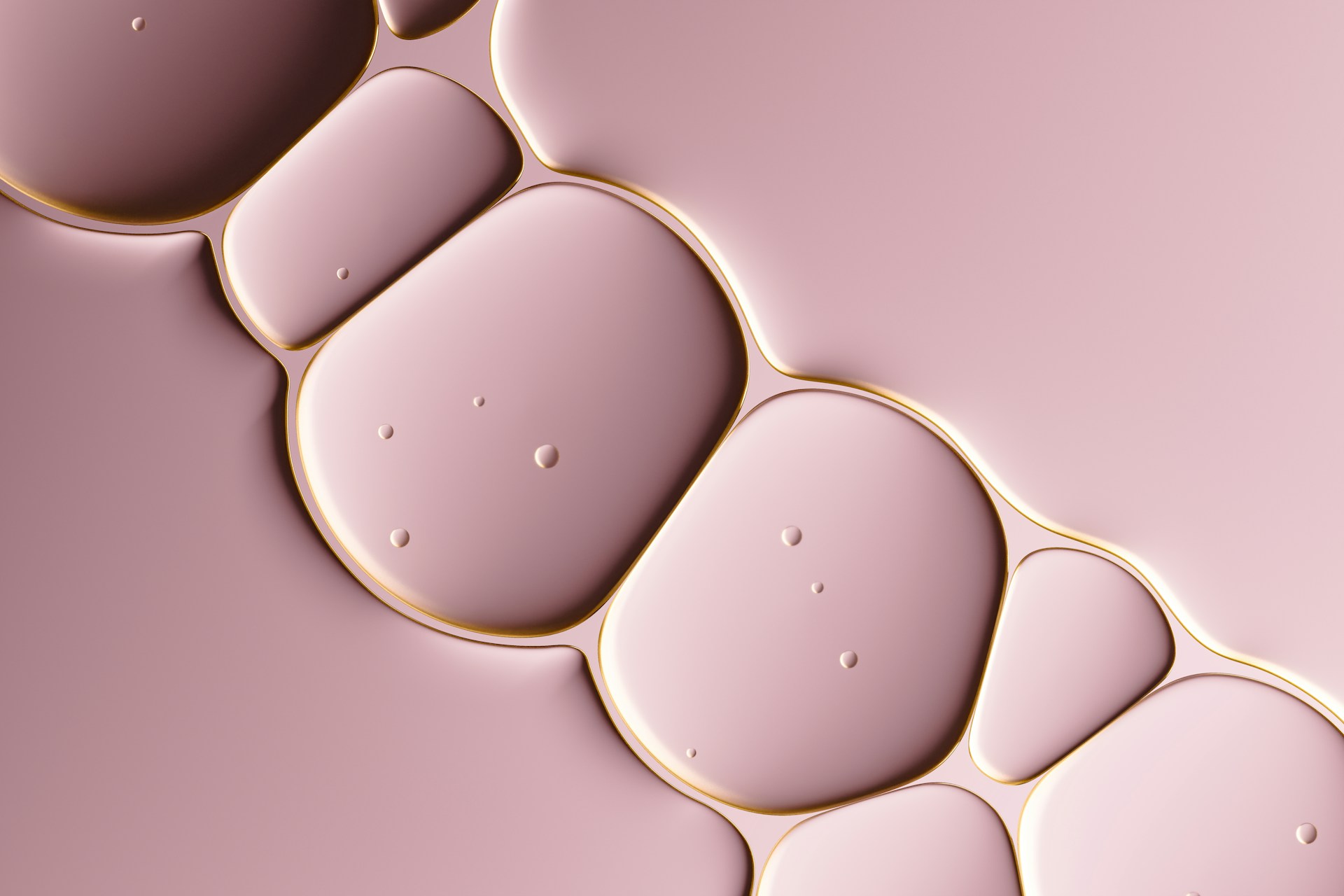 Macro image of oil droplets forming a smooth film, used to represent lipid system behaviour and bioaffinity in modern textures.
