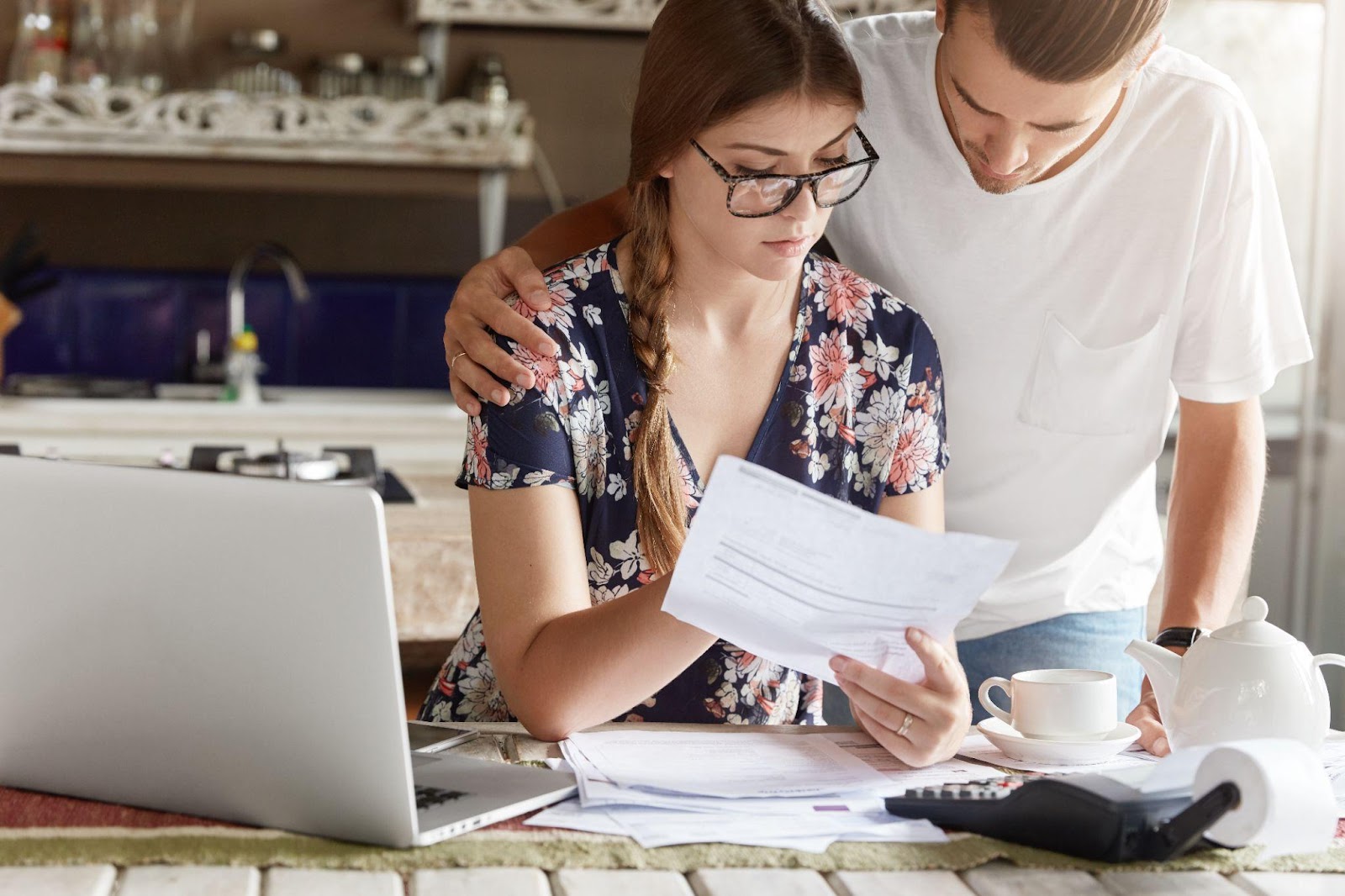 Couple reviewing an invoice.