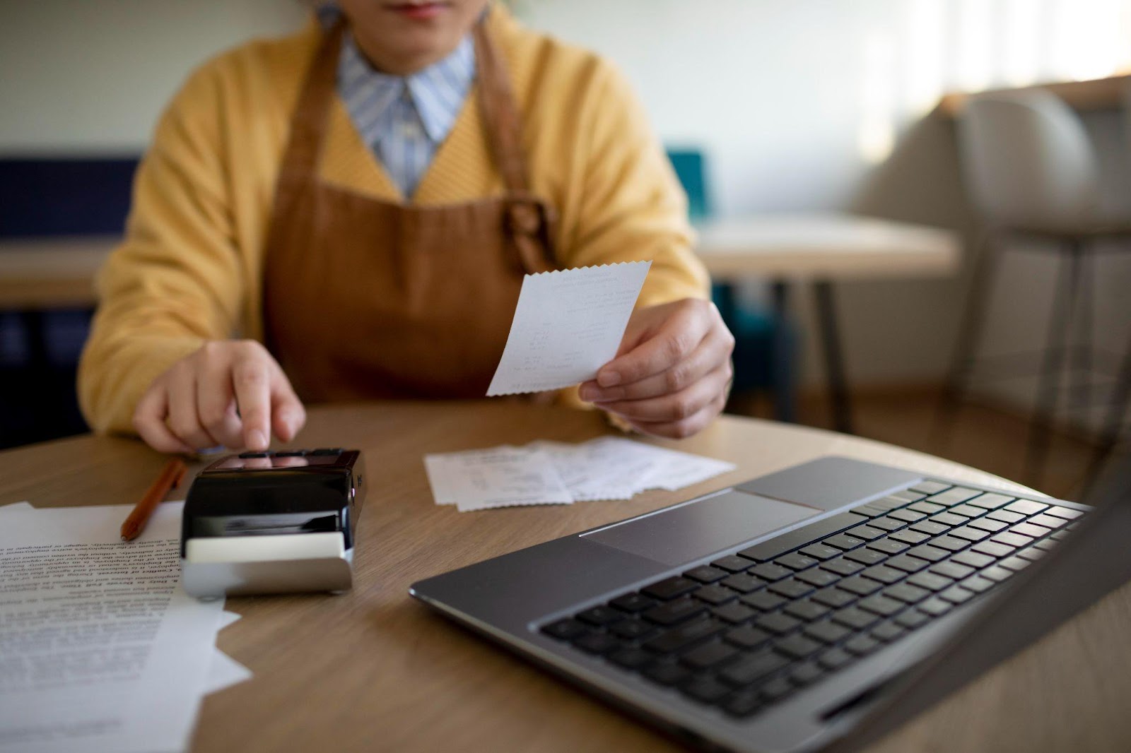 business owner revising bills