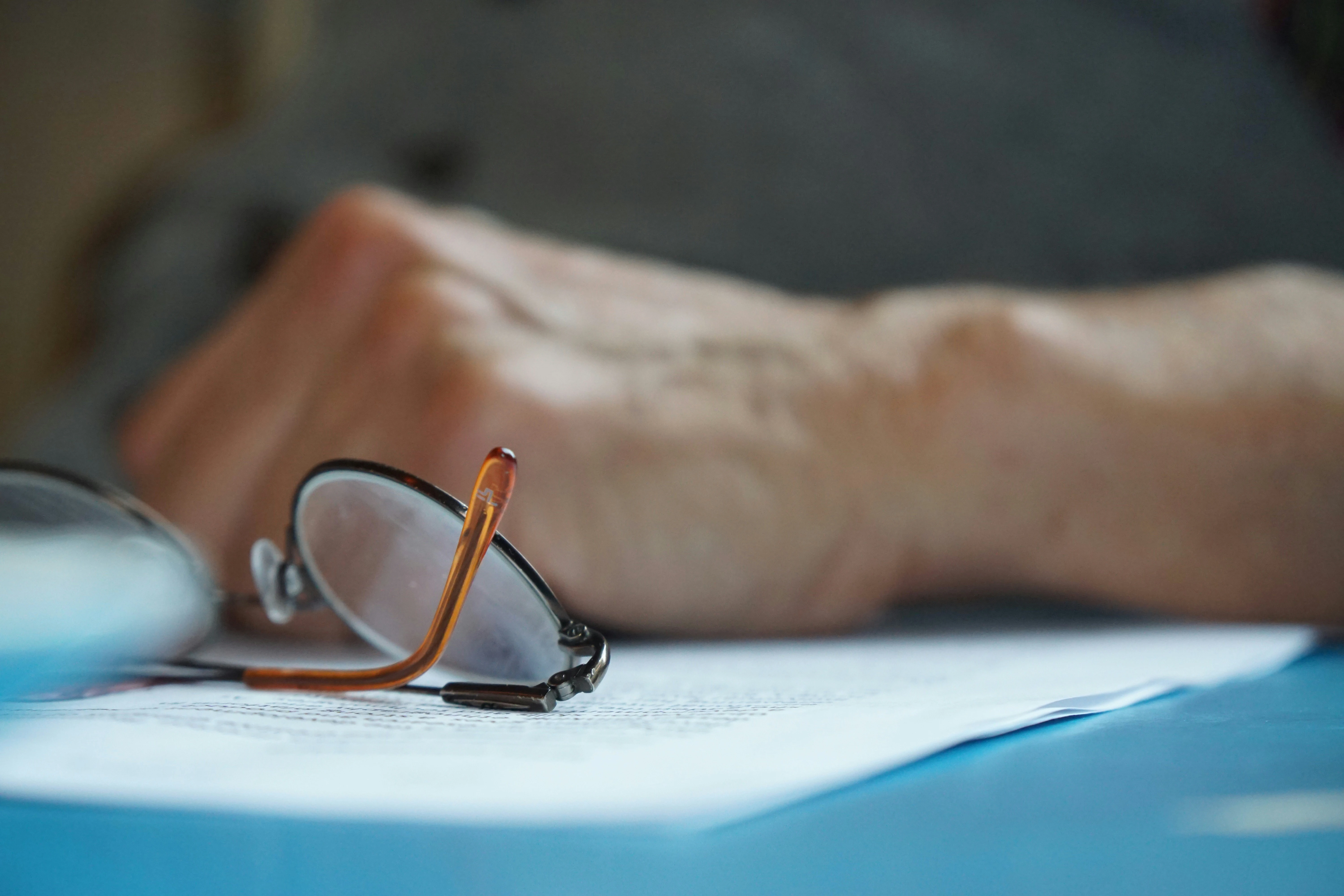 A person filling out a job estimate