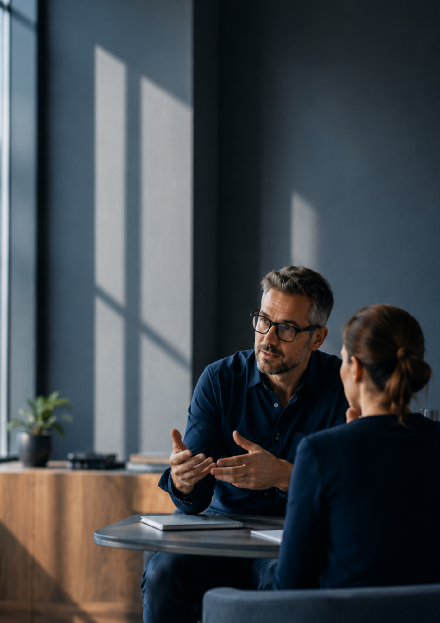 Leader in conversation with colleagues