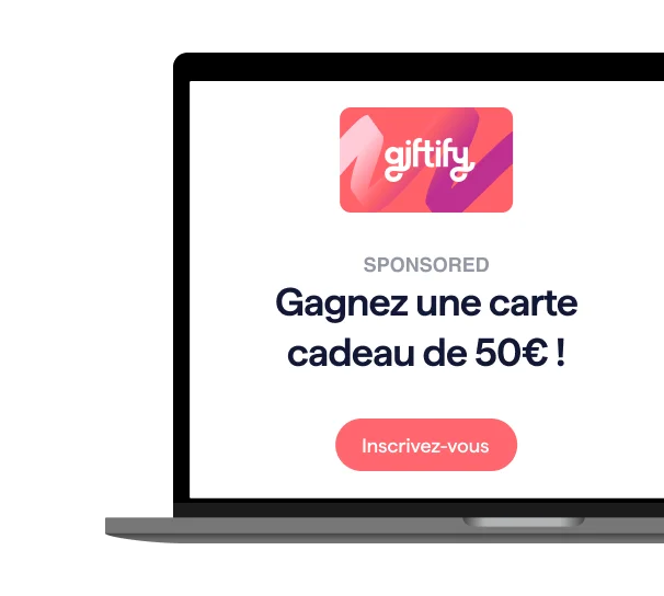 Une publicité numérique pour Giftify affichée sur l'écran d'un ordinateur portable. L'annonce comporte le logo Giftify et le texte « Vous voulez toujours cette carte-cadeau de 50 euros ? » avec un bouton « Inscrivez-vous aujourd'hui » en dessous.