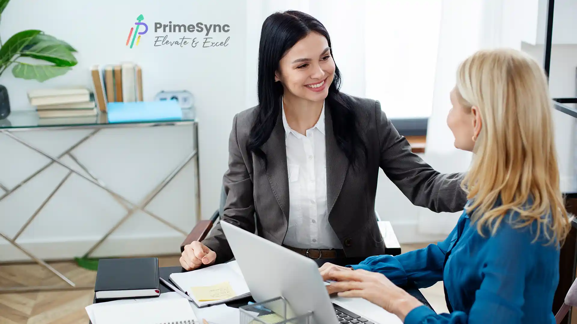 A PrimeSync representative working with a client. 