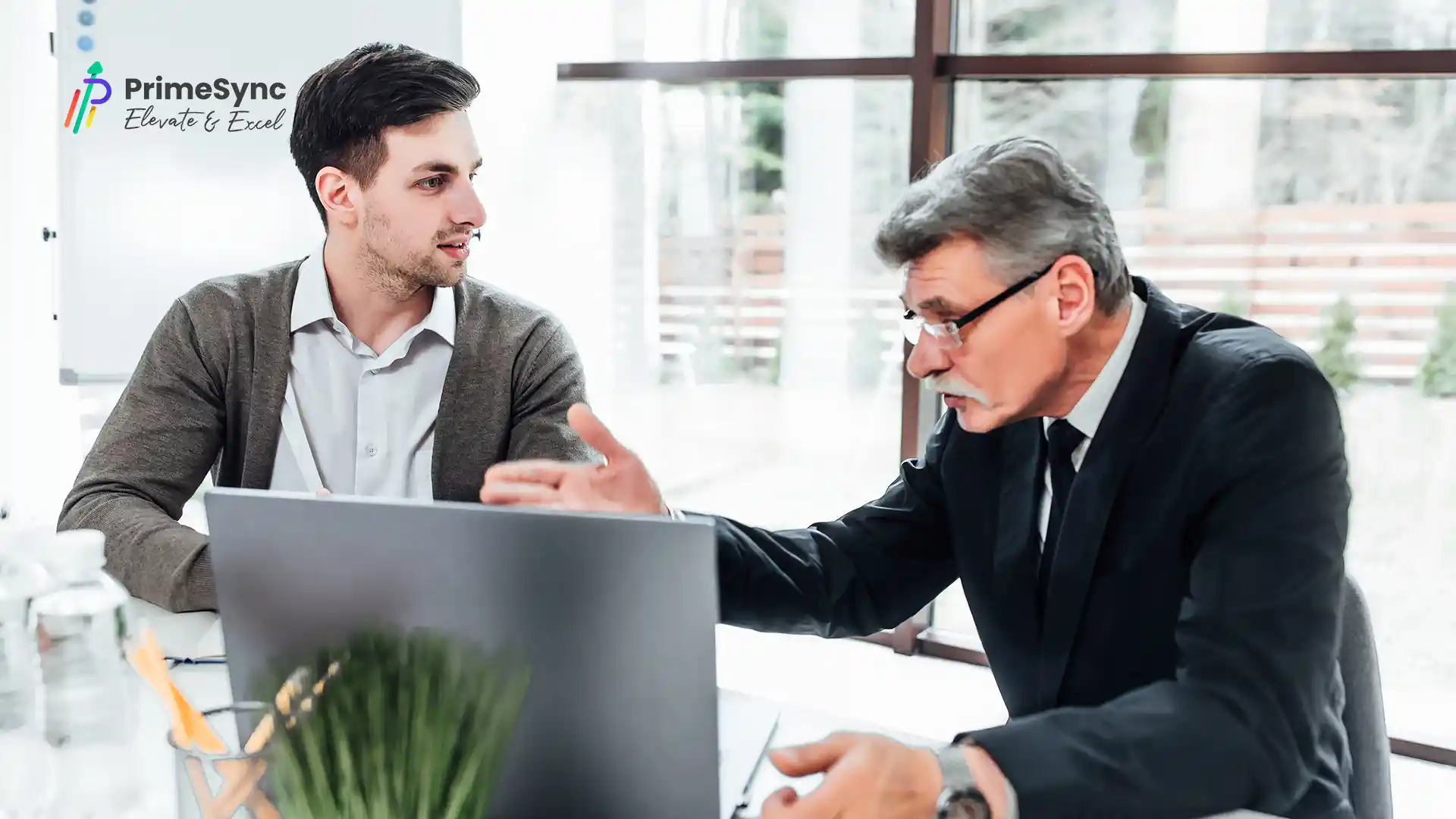a PrimeSync representative talking with a client