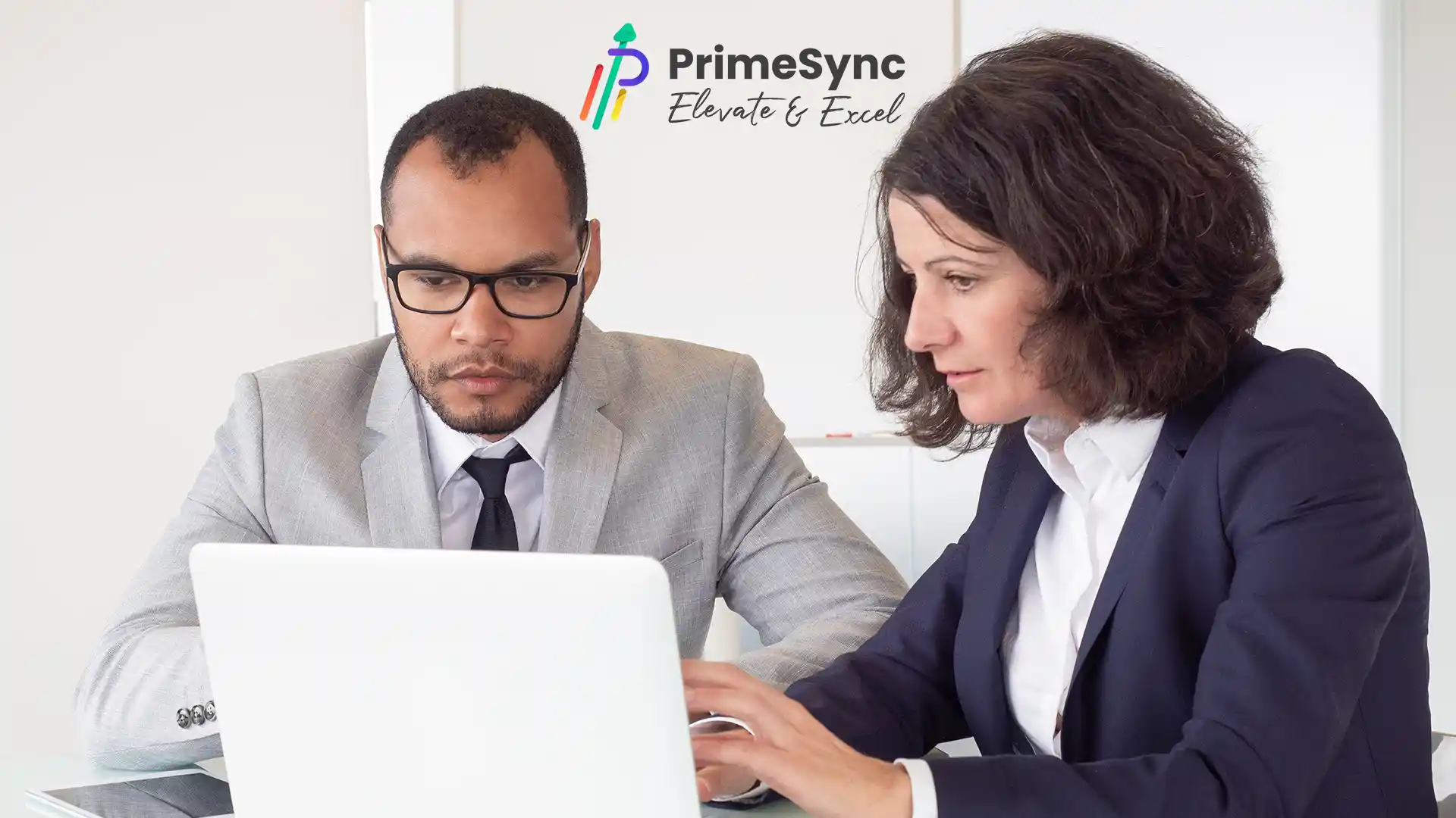 A PrimeSync representative working with a client.
