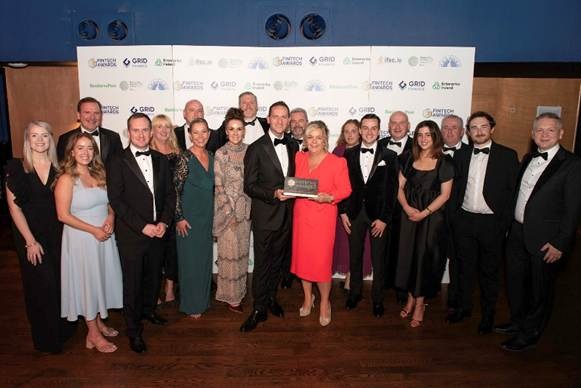 A group of people posing for a photoAI-generated content may be incorrect.