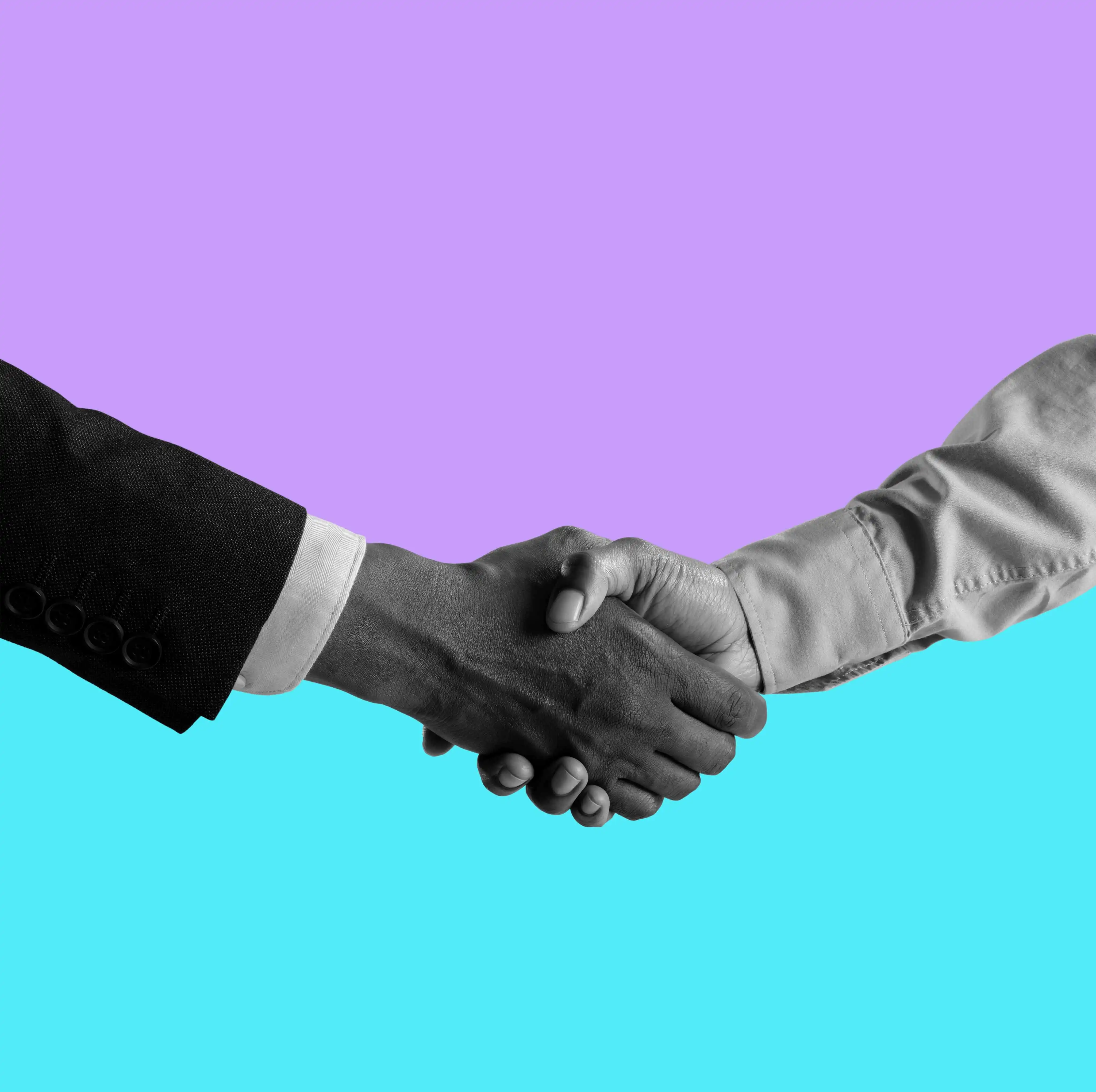 A grayscale image depicts two hands shaking hands against a backdrop of vibrant, contrasting colors