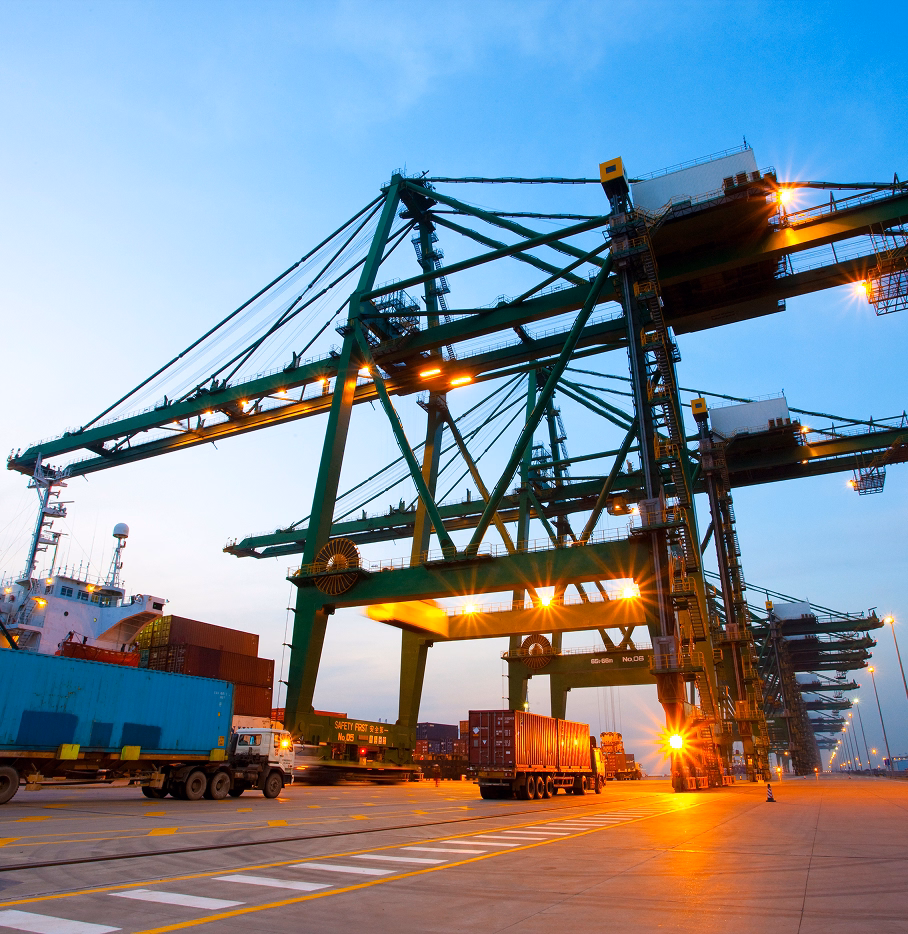 Port logistics and container cranes representing traceable, regulation-aligned industrial supply chains.