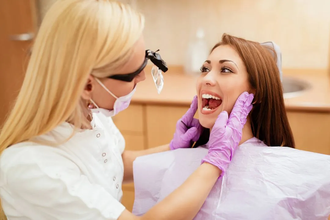 dentist examining  teeth