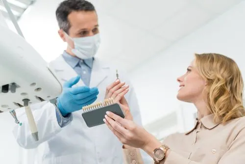 dentist disucssing dental implants