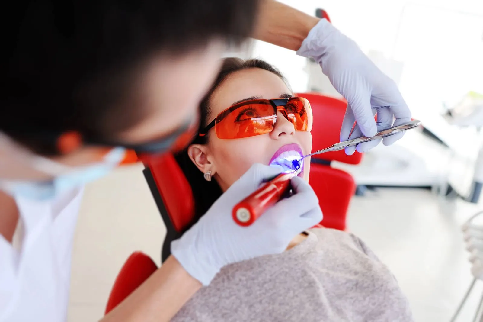 female dental patient getting dental fillings