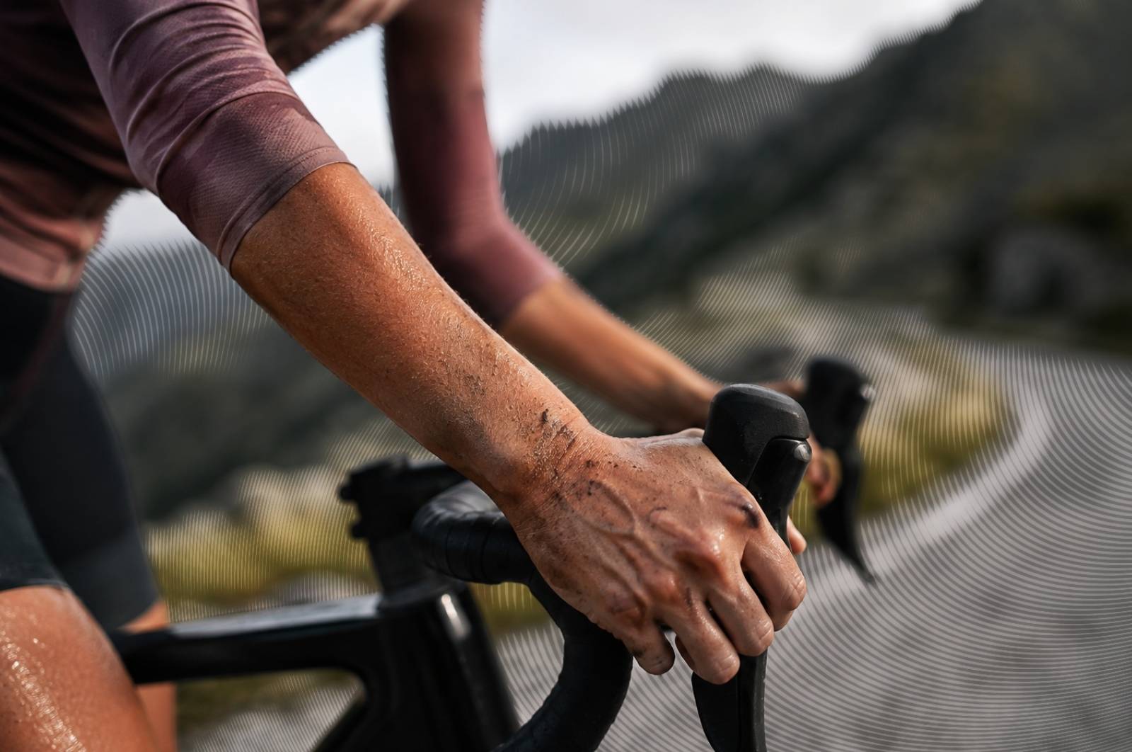 cyclist's-hands-gripping-drop-handlebars.jpg