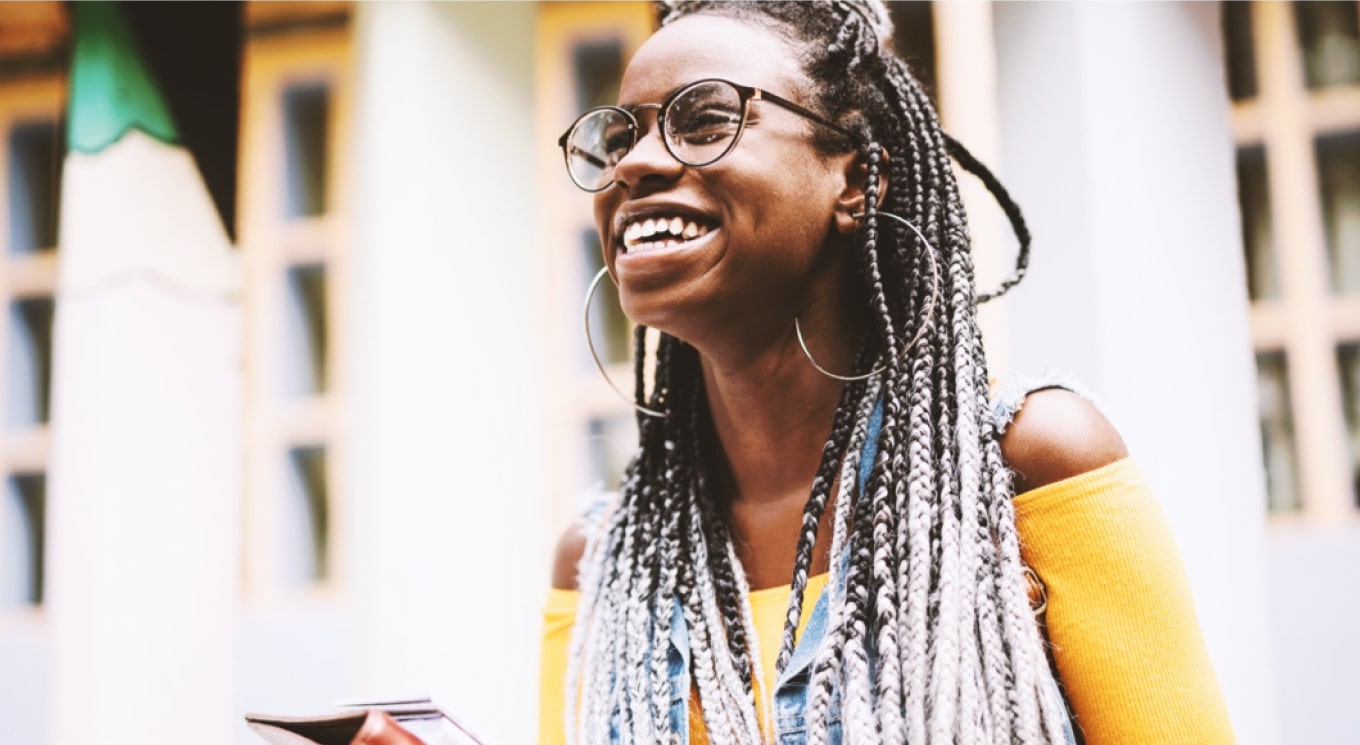 Woman smiling and laughing.
