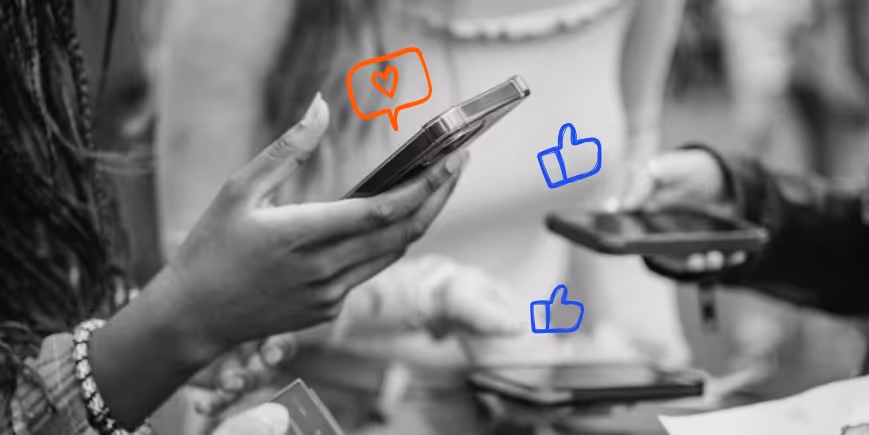 Close-up of people holding smartphones with illustrated social media icons of likes and a heart.