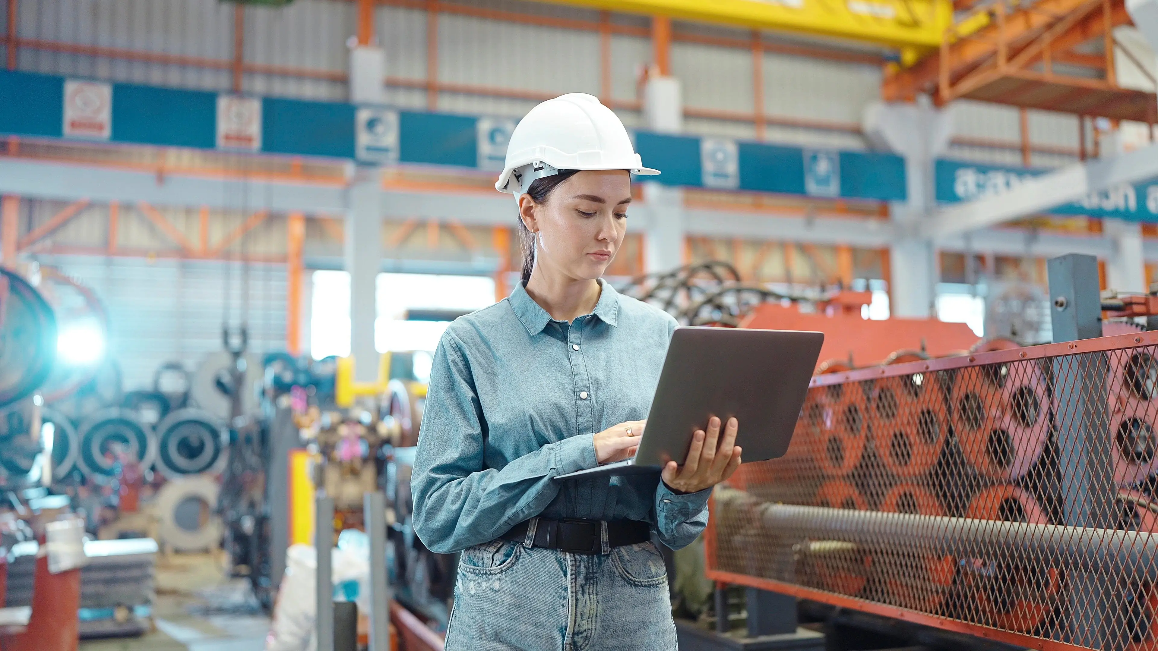 Experienced manufacturing professional working on a production floor, representing passive talent already employed and not actively searching for new opportunities.