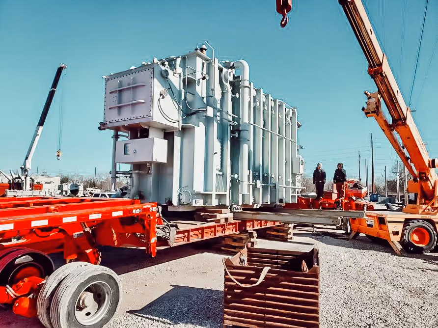 A large piece of equipment being transported by truck