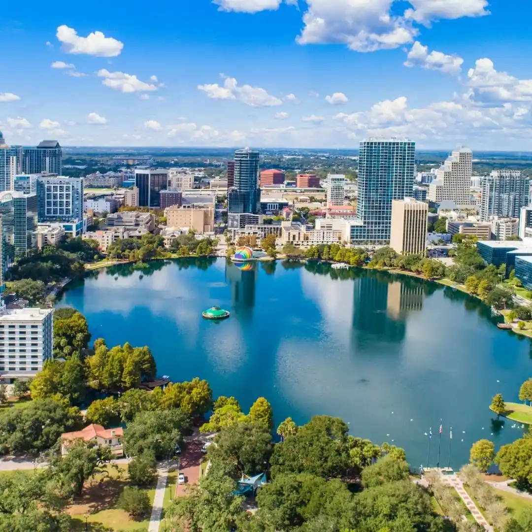 Aerial view of Orlando downtown skyline with Lake Eola and surrounding buildings