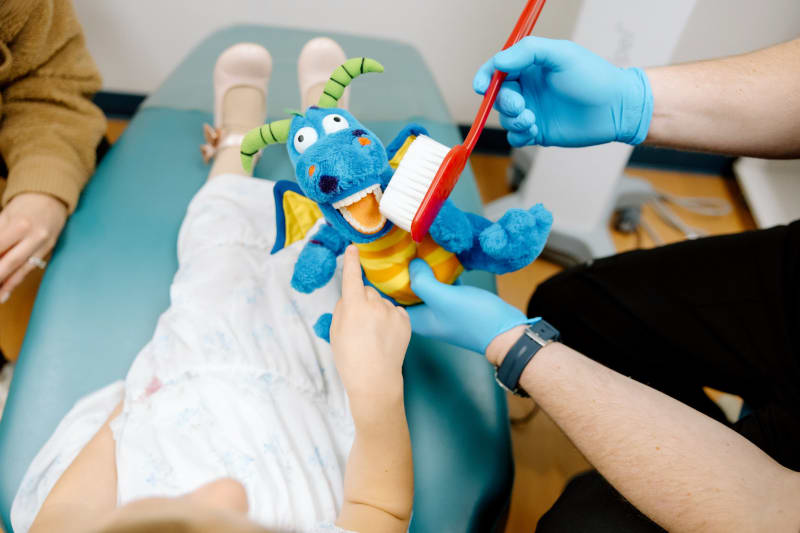 Fluoride varnish application at Frederick Pediatric Dentistry in Maryland for children's dental health protection.