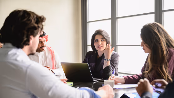 stock photo men and women talking at table