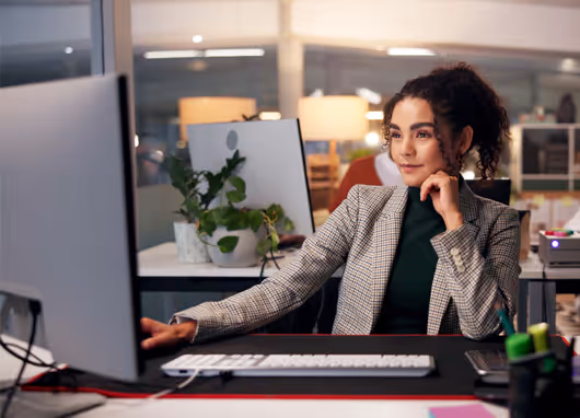 stock photo businesswoman at desk on computer