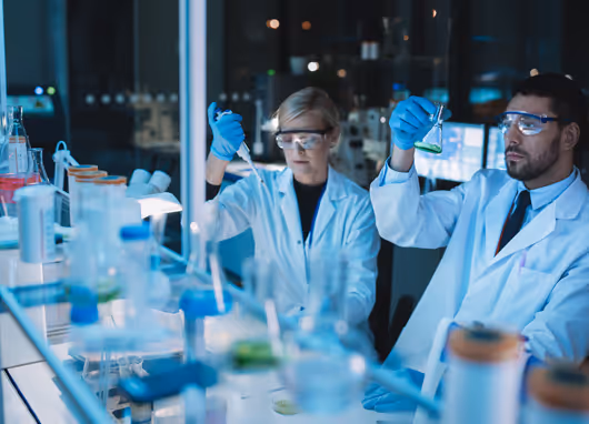 stock photo scientists in lab setting
