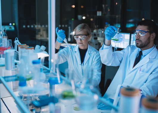 stock photo scientists in lab setting