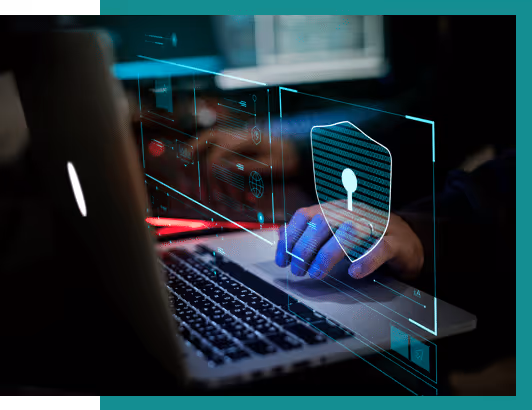 stock photo hand on laptop keyboard with overlay of security lock icon
