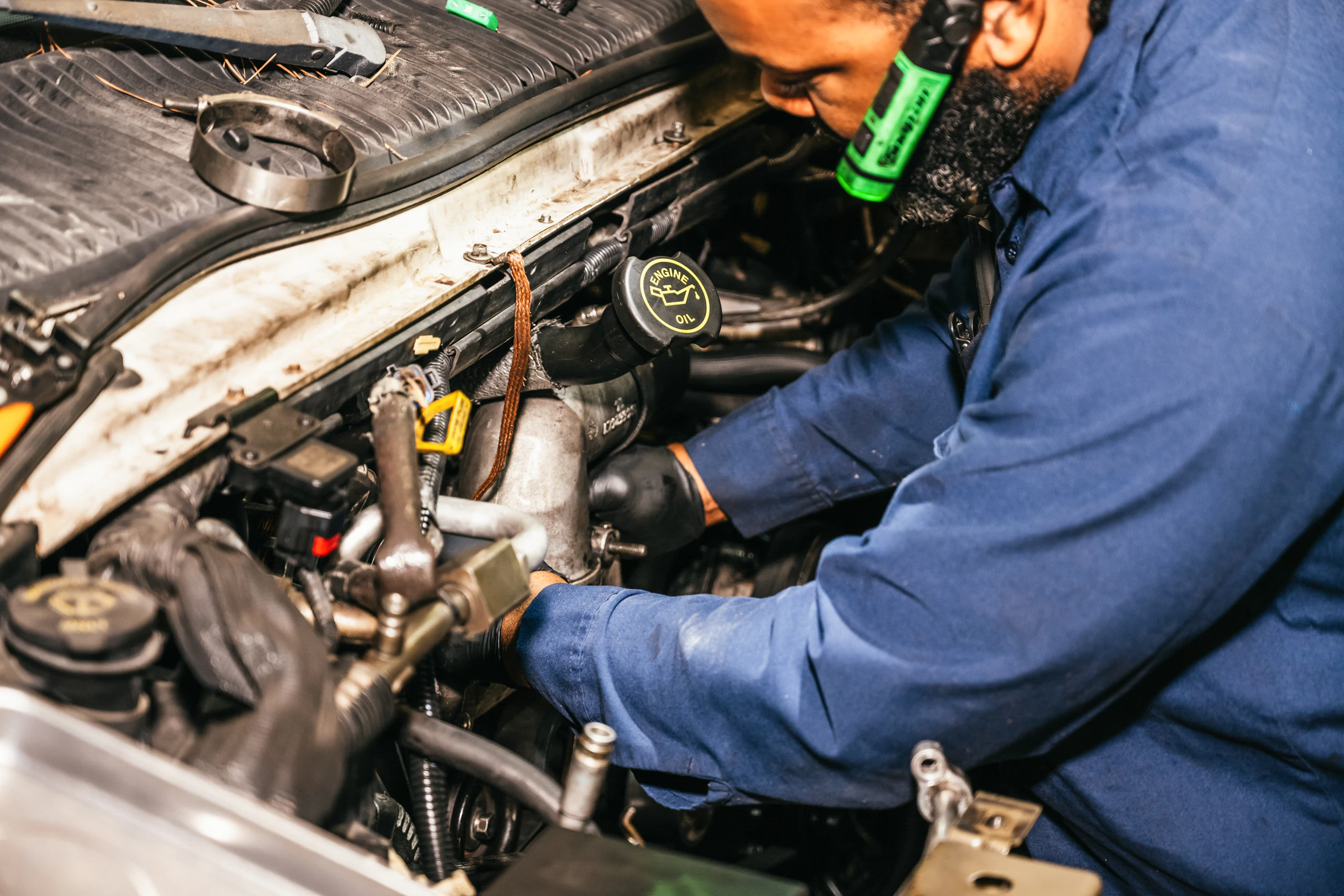 Mechanic performing diesel repair in Weyburn, SK