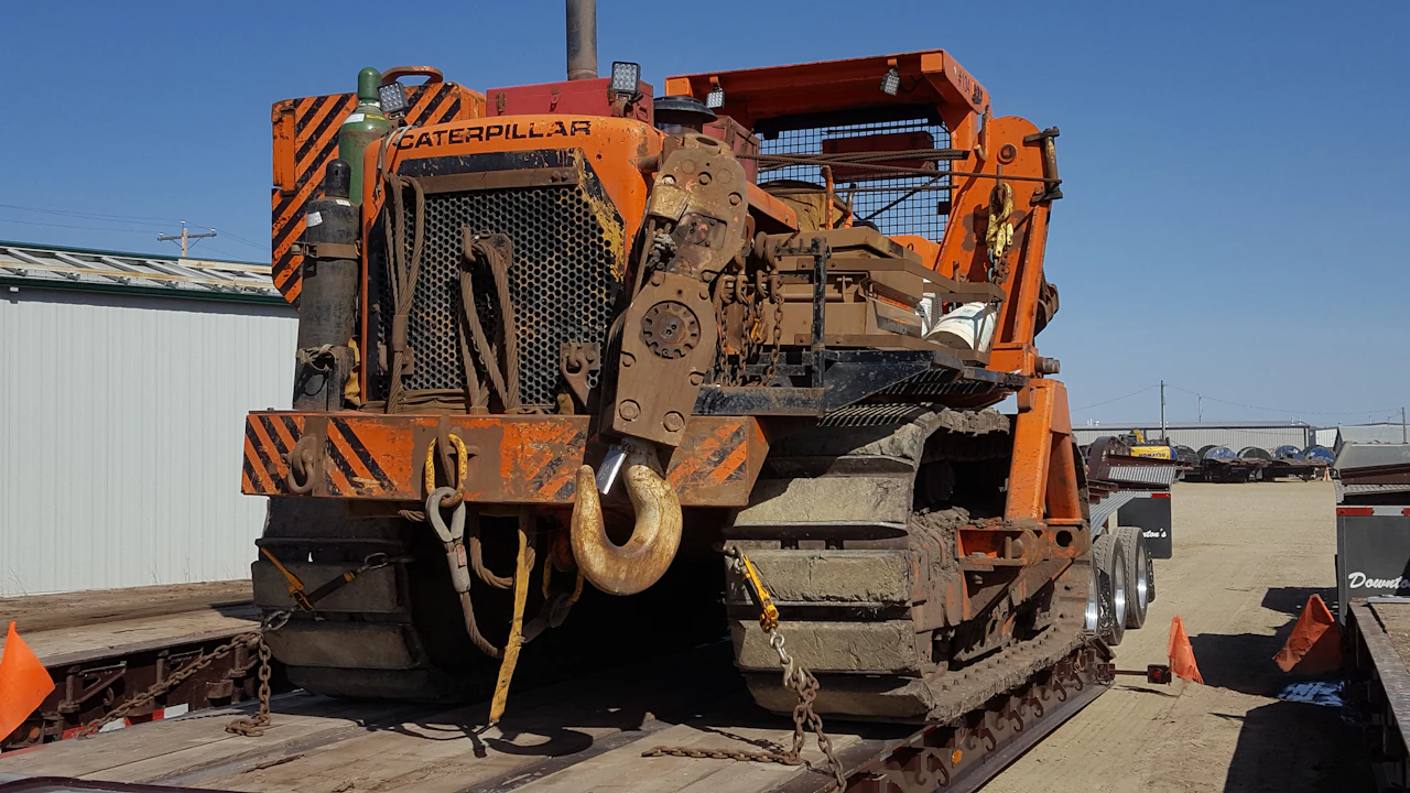 pipelayer on a lowboy