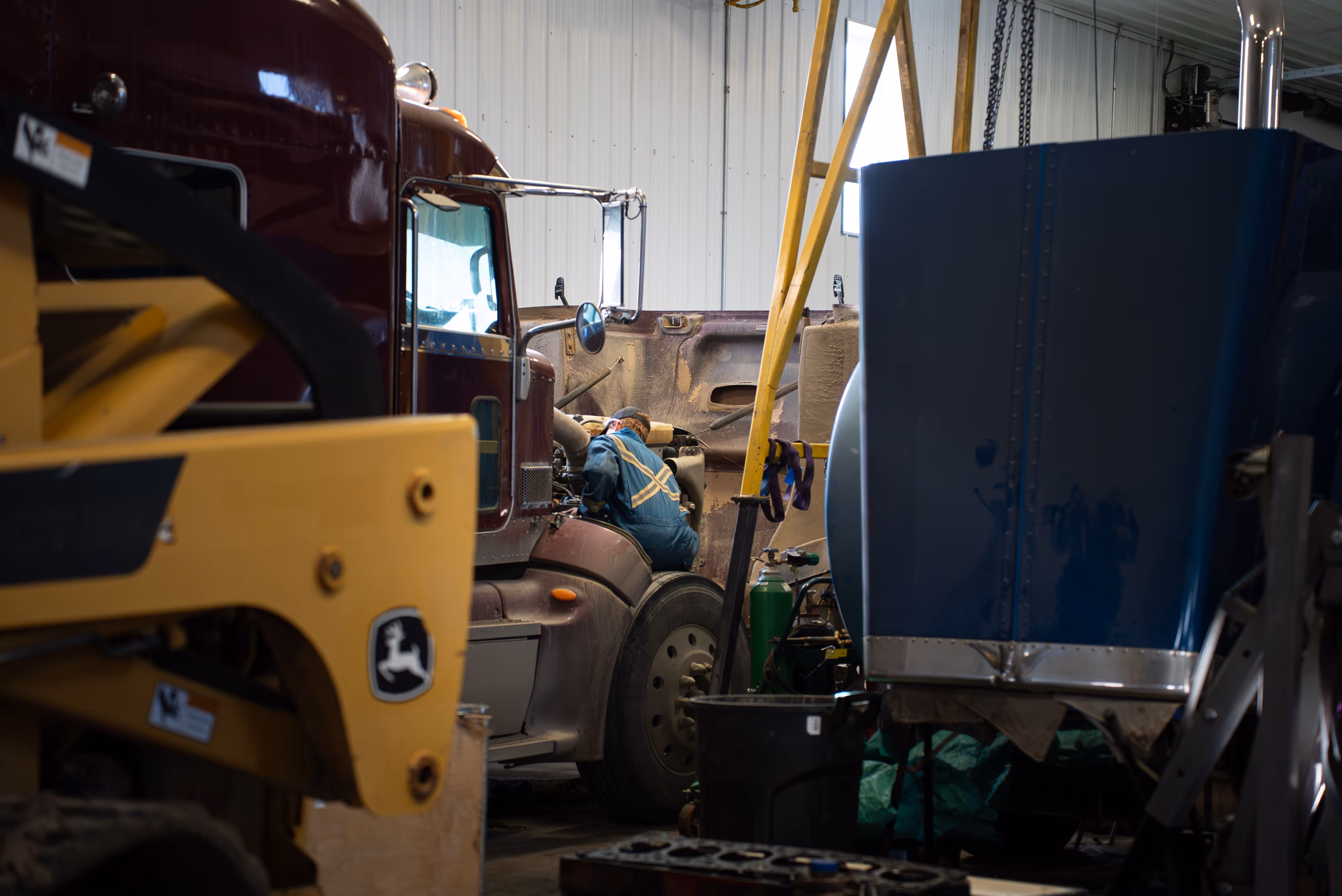 Diesel mechanic performing CVIP Inspection in Weyburn, SK