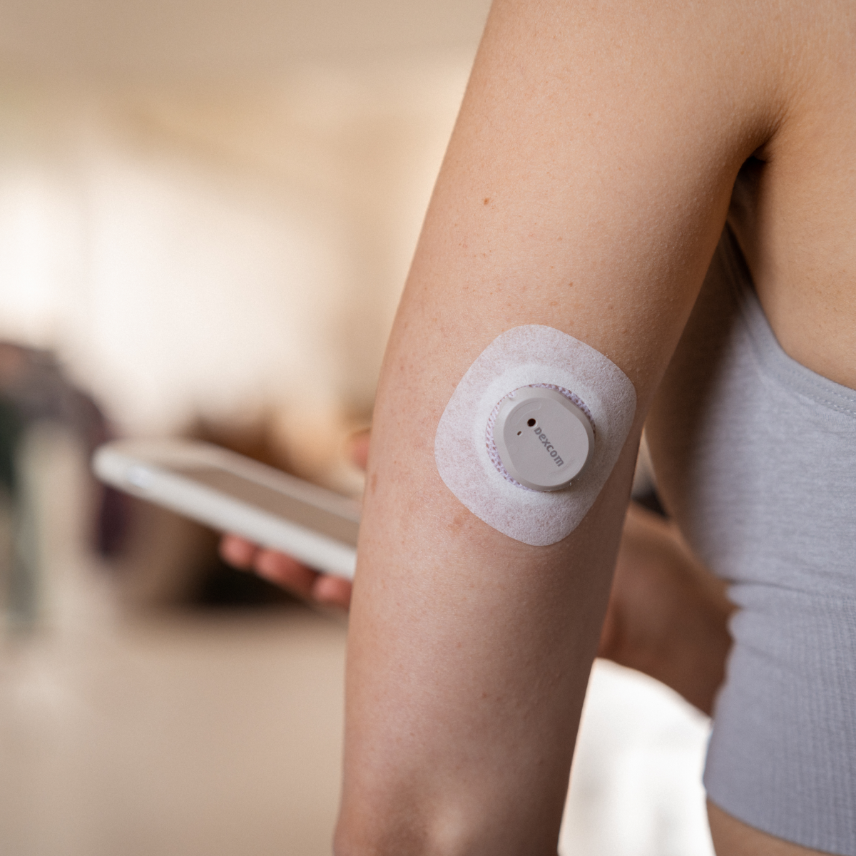 A dexcom G6 continuous glucose monitor (CGM)