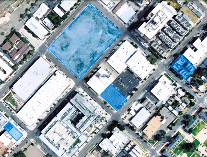 Aerial view of urban parcels used in real estate portfolio governance and integration led by a fractional CDO.