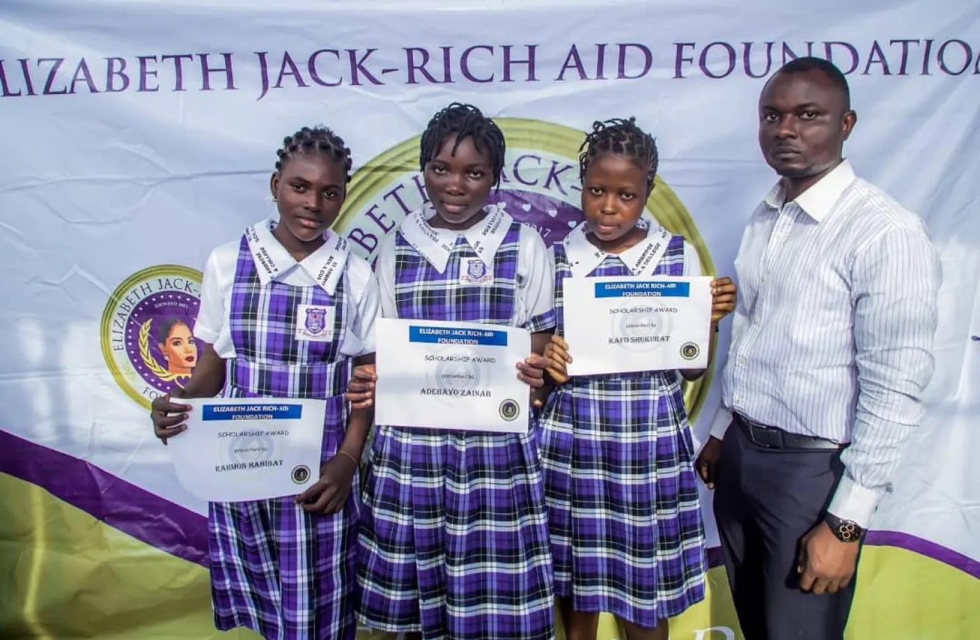 Elizabeth Jack-Rich Aid Foundation donation cheque presentation
