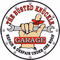 Vintage garage logo with wrench and fist, automotive repair emblem
