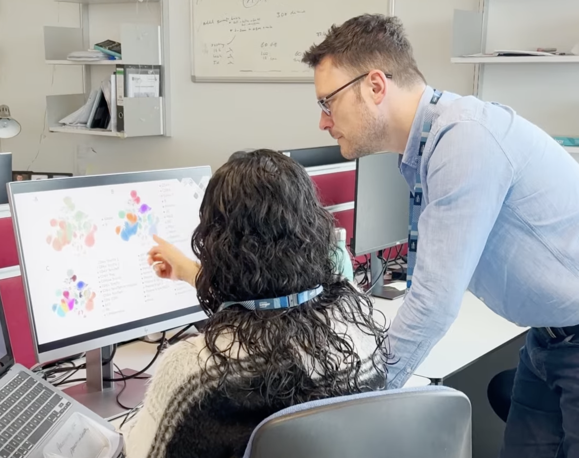image of a student presenting research at a university event