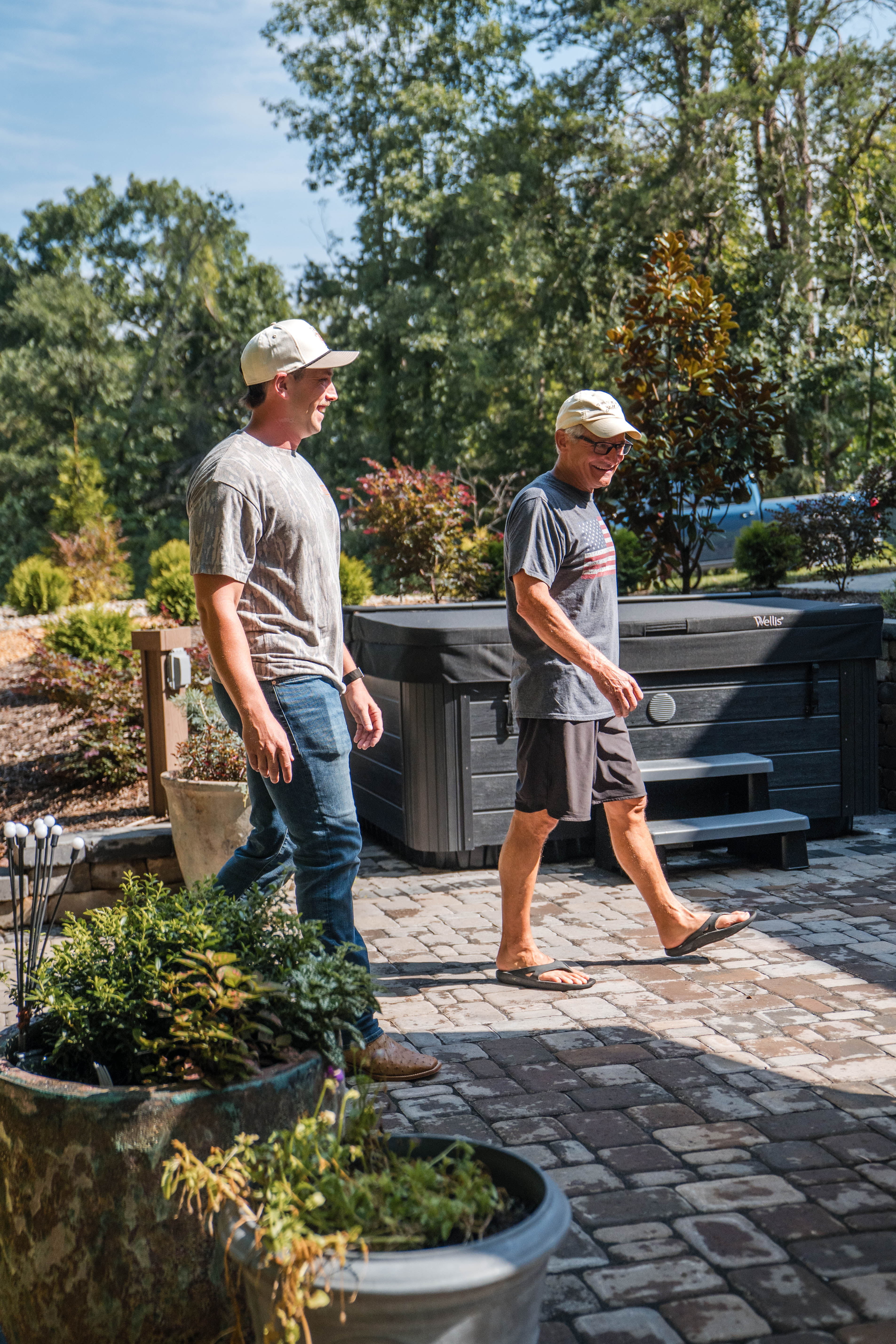 Gavin Hammel, owner of Hammel Hardscapes, talking with a client. 