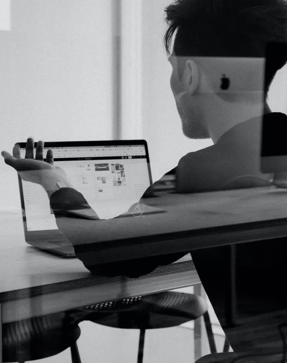Team Members Looking at Laptops