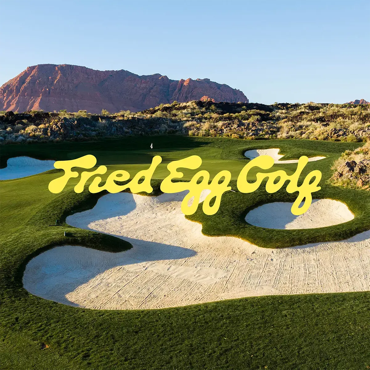 A beautiful golf course with the Fried Egg Golf Logo