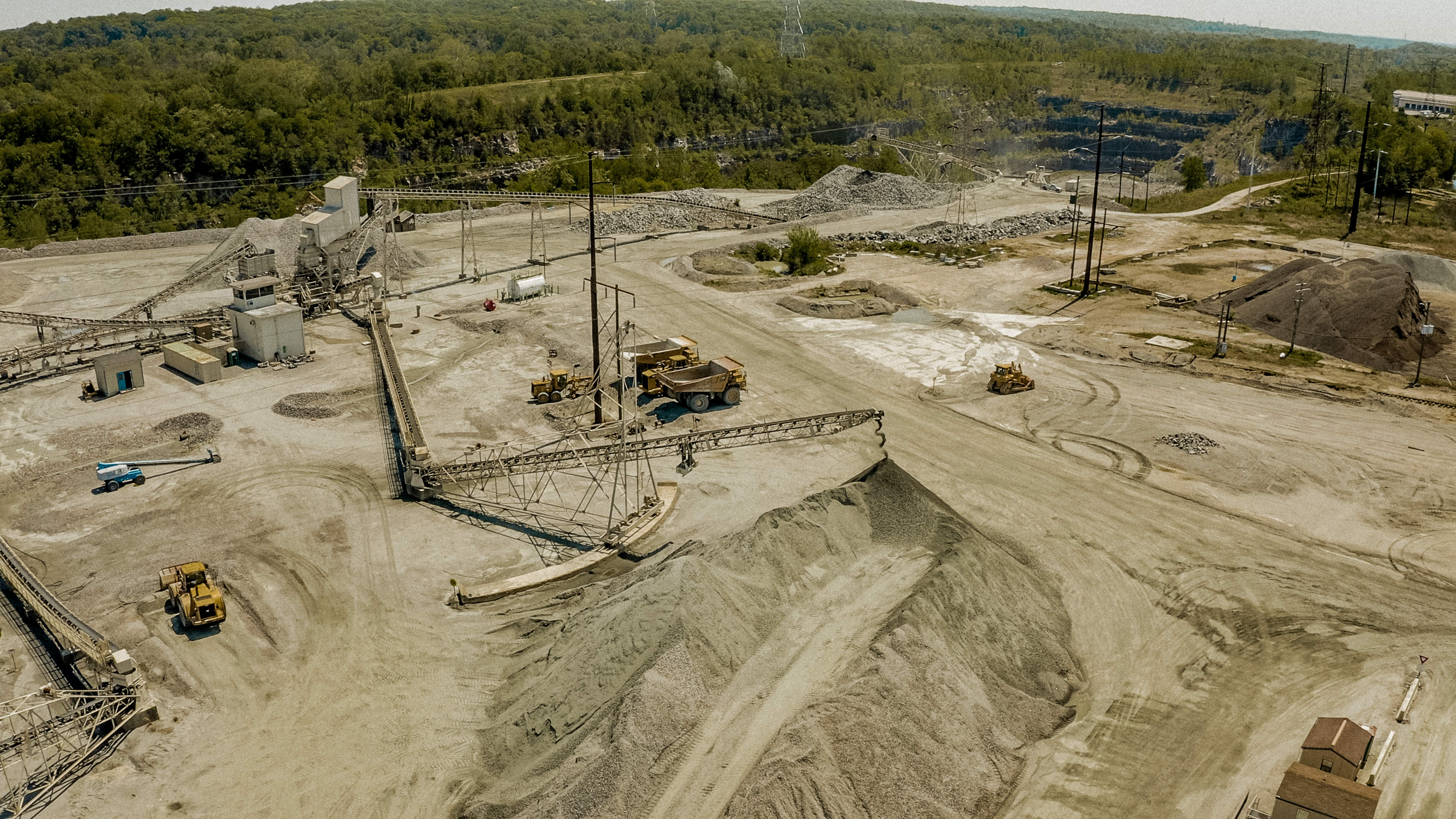 Shirley Gap 64: Conveyors beside aggregate stockpiles.