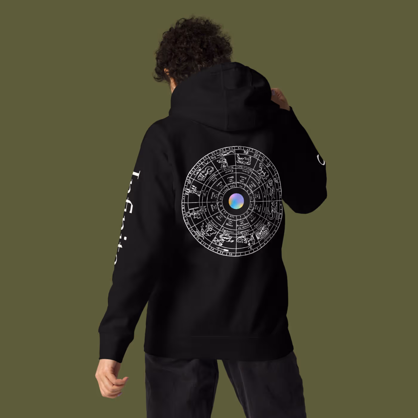 Black hoodie back featuring large circular mandala compass design