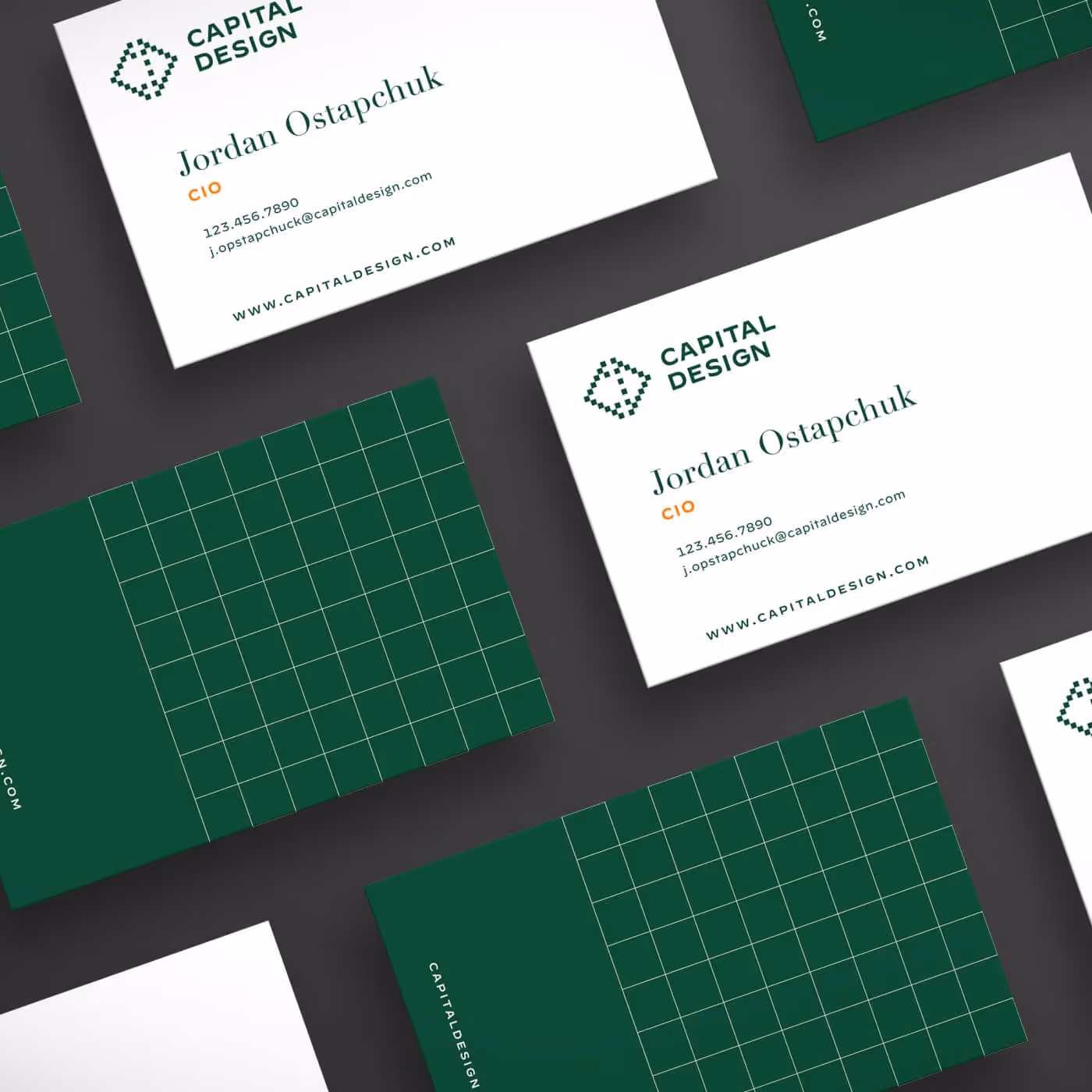 Capital Design business card system and branded materials featuring green grid pattern and pixelated diamond logo