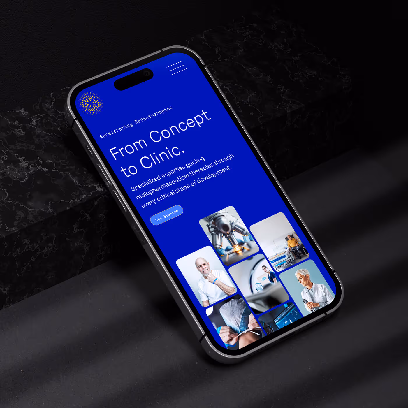 iPhone displaying Theragnostic Insights mobile website with "From Concept to Clinic" messaging and medical imagery on dark marble surface